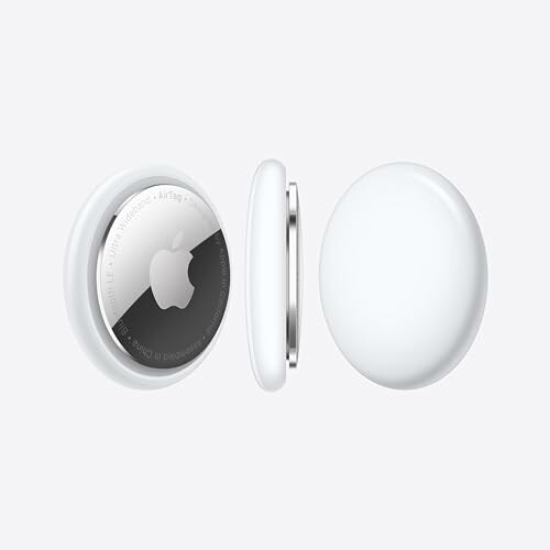 Apple AirTag showing front and back view.