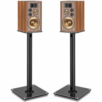 Pair of vintage wooden speakers on black stands.